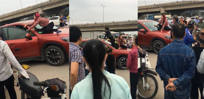 Hà Nội: 2 phụ nữ trèo lên ô tô, dùng gậy đập cửa kính đánh ghen ngay trên phố - Ảnh 2. Hà Nội: 2 phụ nữ trèo lên ô tô, dùng gậy đập cửa kính đánh ghen ngay trên phố - Ảnh 2.