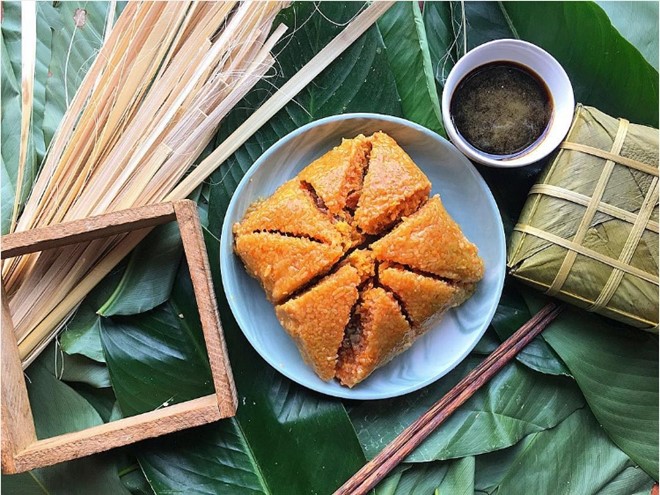 Những kiểu bánh chưng độc đáo dịp Tết cổ truyền - Ảnh 1. Những kiểu bánh chưng độc đáo dịp Tết cổ truyền - Ảnh 1.