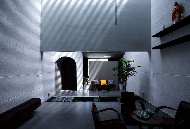 Ngôi nhà 200m² lấy cảm hứng thiết kế từ hang Sơn Đoòng ở Vĩnh Long nổi bật trên báo Mỹ - Ảnh 4.