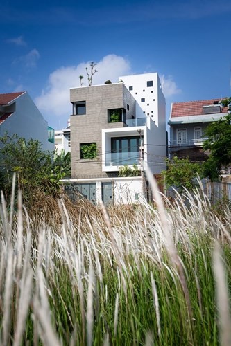 Căn nhà phố hiện đại, yên tĩnh ở ngoại ô Sài Gòn - Ảnh 1.