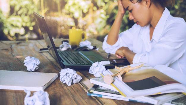 asian-woman-sitting-working-stressed_36074-810_13836549