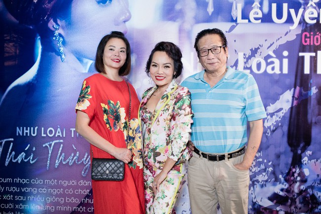 Diện đầm d&agrave;i thướt tha, Th&aacute;i Th&ugrave;y Linh nồng n&agrave;n khoe giọng h&aacute;t - Ảnh 2.