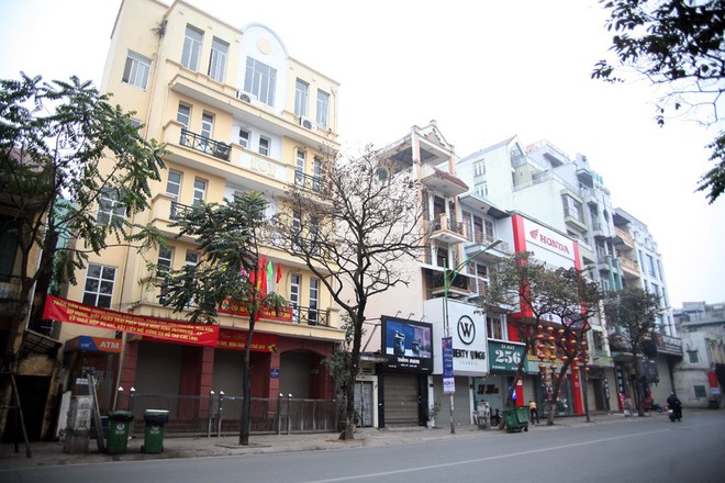 Sáng 29 Tết, nhiều tuyến phố Hà Nội đã vắng bóng người qua lại - Ảnh 9.