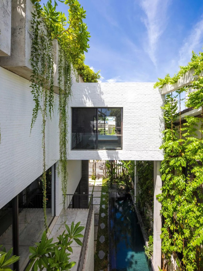 Ngôi nhà đầy gió tự nhiên, cây xanh và ánh sáng thân thiện với môi trường dành cho gia đình 5 người ở Đà Nẵng - Ảnh 4.