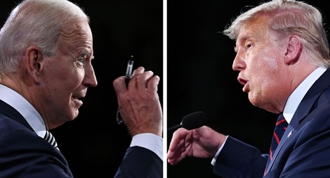 Ông Trump - ông Biden vẫn đối đầu nảy lửa dù không chạm mặt - Ảnh 1. Ông Trump - ông Biden vẫn đối đầu nảy lửa dù không chạm mặt - Ảnh 1.