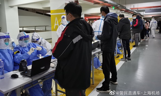 Thượng Hải: Sân bay đóng cửa, xét nghiệm nhân viên vì phát hiện ổ dịch COVID-19 - Ảnh 2.