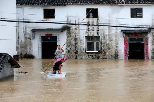 Mưa lớn không dứt, Trung Quốc nâng mức phản ứng lũ lụt lên mức cao thứ 2 - Ảnh 6.