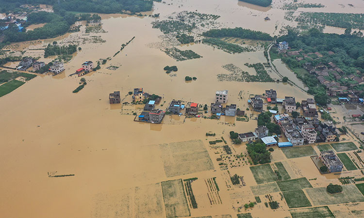 Mưa lớn không dứt, Trung Quốc nâng mức phản ứng lũ lụt lên mức cao thứ 2 - Ảnh 1.