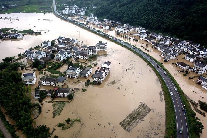 Mưa lớn không dứt, Trung Quốc nâng mức phản ứng lũ lụt lên mức cao thứ 2 - Ảnh 3.