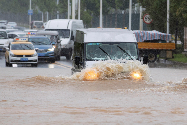 Mưa lớn không dứt, Trung Quốc nâng mức phản ứng lũ lụt lên mức cao thứ 2 - Ảnh 4.