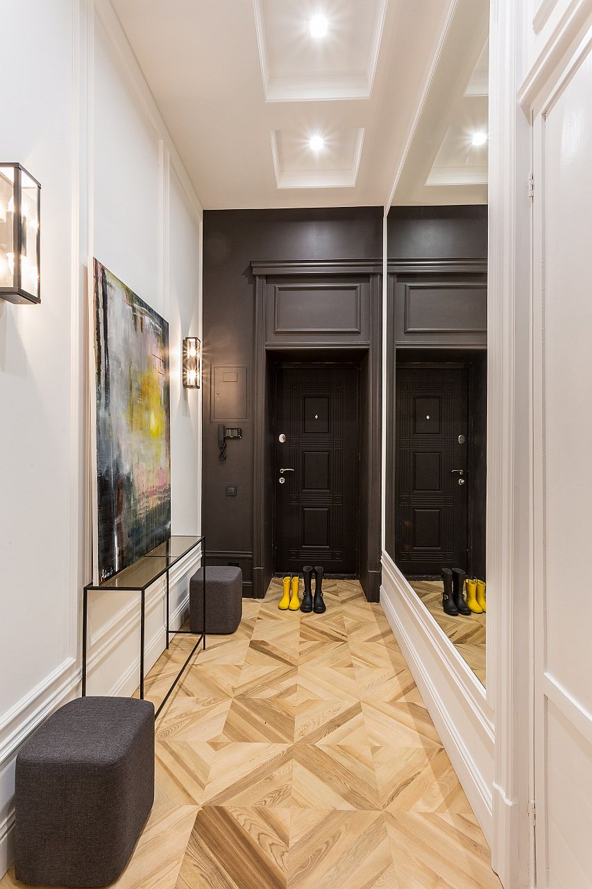 mirror-at-the-entry-hallway-gives-the-interior-a-more-spacious-and-stylish-look-51055-15964705715361479850042.jpg