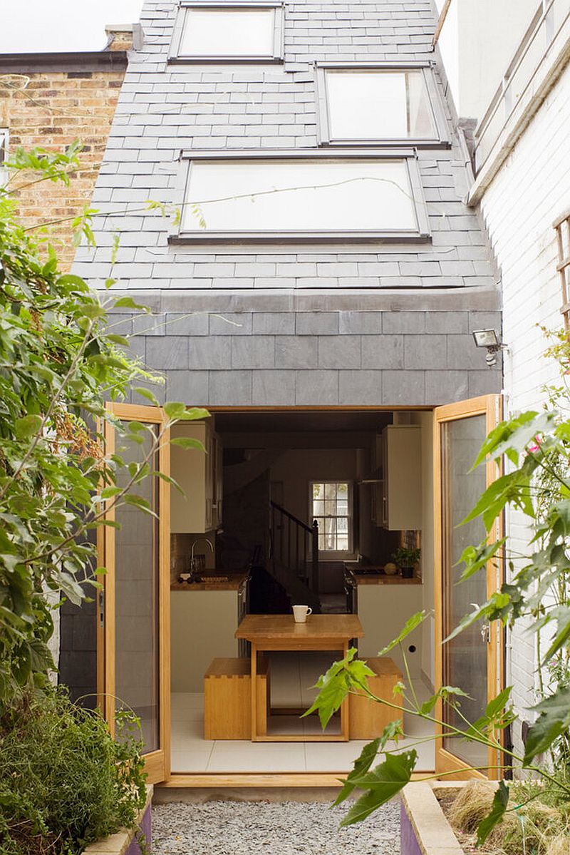 modern-slim-house-in-london-with-a-gray-and-wood-exterior-and-a-sloped-ceiling-that-has-staggered-skylight-43232-16013550388701200526797.jpg