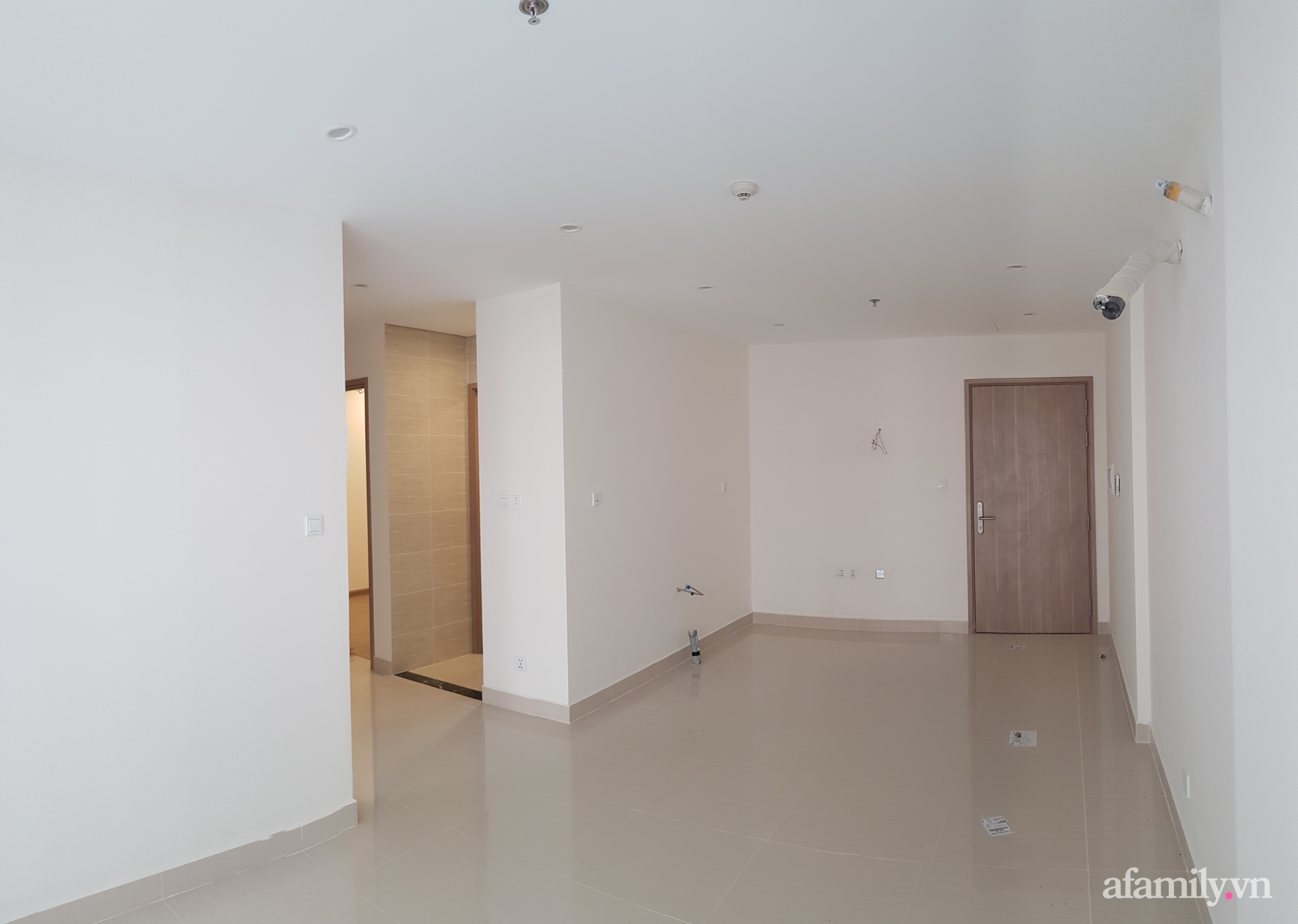 Căn hộ 55m² đẹp tinh tế, hoài cổ với phong cách Indochine ở ngoại thành Hà Nội - Ảnh 1.