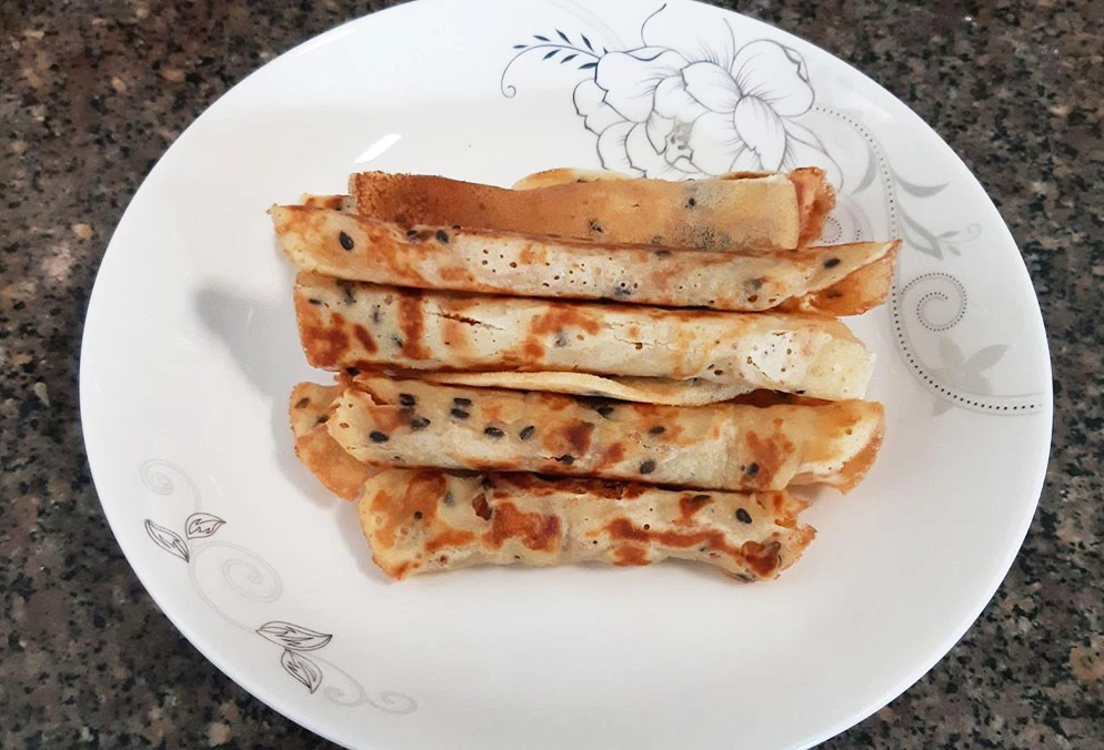 Mách chị em cách làm bánh mè từ cơm nguội cực đơn giản mà ngon lắm nha! - Ảnh 1. Mách chị em cách làm bánh mè từ cơm nguội cực đơn giản mà ngon lắm nha! - Ảnh 1.