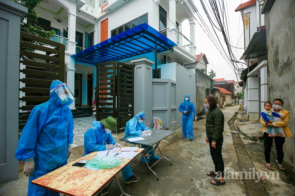 Hà Nội: Lấy gần 13.000 mẫu xét nghiệm để tách F0 khỏi cộng đồng tại ổ dịch huyện Mê Linh - Ảnh 9.