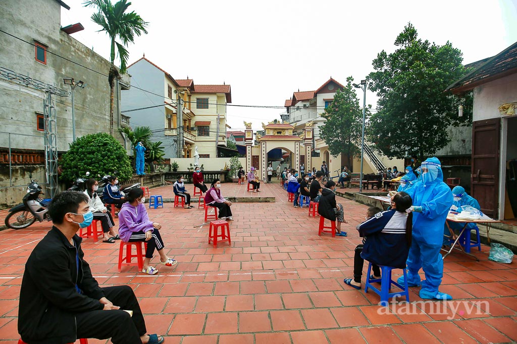 Hà Nội: Lấy gần 13.000 mẫu xét nghiệm để tách F0 khỏi cộng đồng tại ổ dịch huyện Mê Linh - Ảnh 11.