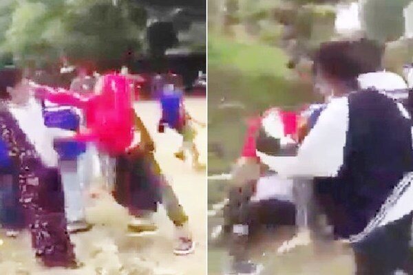 Nhóm học sinh cấp 3 dùng mũ bảo hiểm đánh đập dã man nữ sinh lớp 8 gây phẫn nộ dư luận - Ảnh 2.
