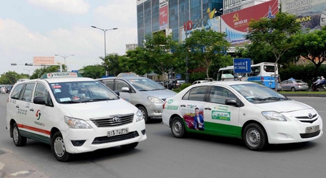 Hai hãng taxi người dân TP Hồ Chí Minh có thể gọi đi sân bay và bệnh viện - Ảnh 1.