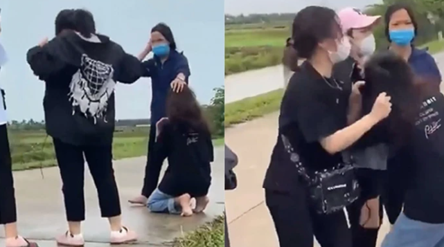 Cô gái trẻ bị nhóm bạn nữ bắt quỳ gối, túm tóc đánh tới tấp ngay giữa đường cùng tiếng cổ vũ: "Hay quá, đánh mạnh lên, tiếp đi" - Ảnh 1. Cô gái trẻ bị nhóm bạn nữ bắt quỳ gối, túm tóc đánh tới tấp ngay giữa đường cùng tiếng cổ vũ: "Hay quá, đánh mạnh lên, tiếp đi" - Ảnh 1.
