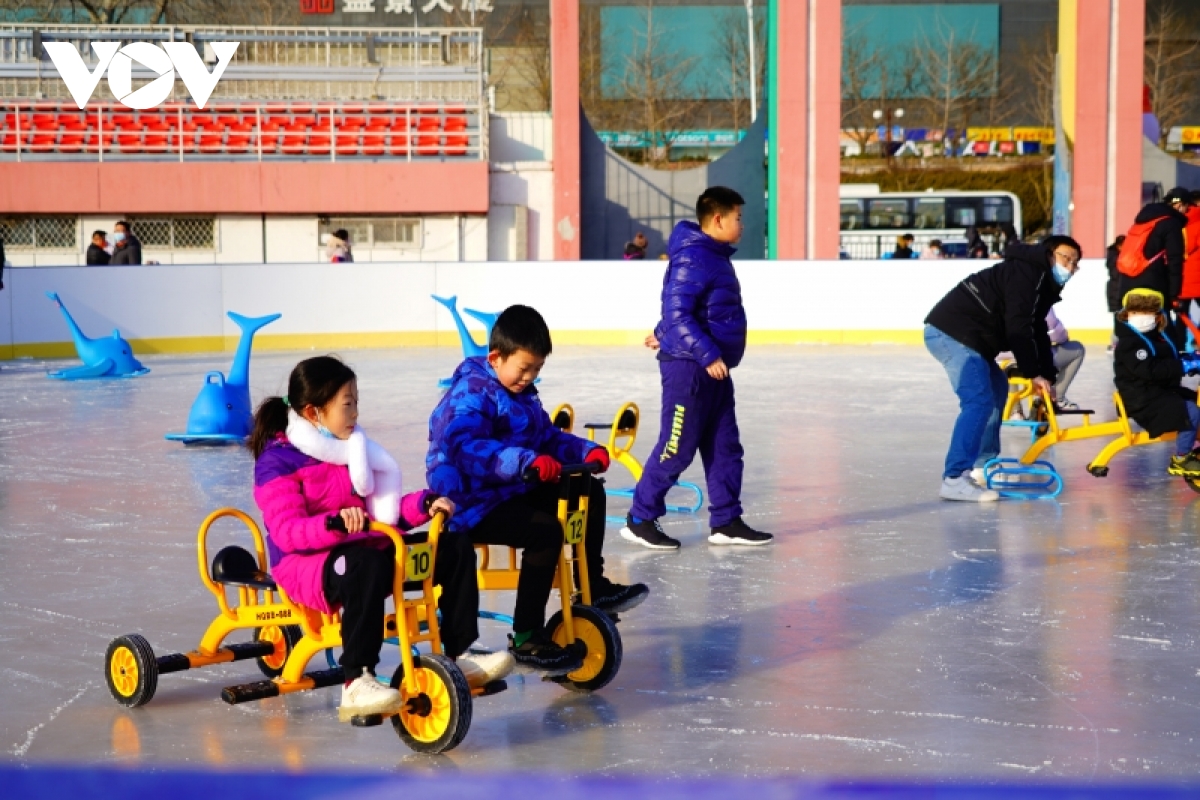 Đường phố Bắc Kinh trang hoàng rực rỡ đón Tết Nhâm Dần và Olympic mùa Đông - Ảnh 16.