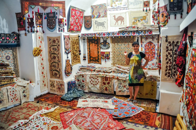 carpet-shop-bukhara-uzbekistan-circa-july-young-girl-poses-city-has-long-served-as-center-84909247-16673172759941076338067-1667377814068-1667377814821641436139.jpg