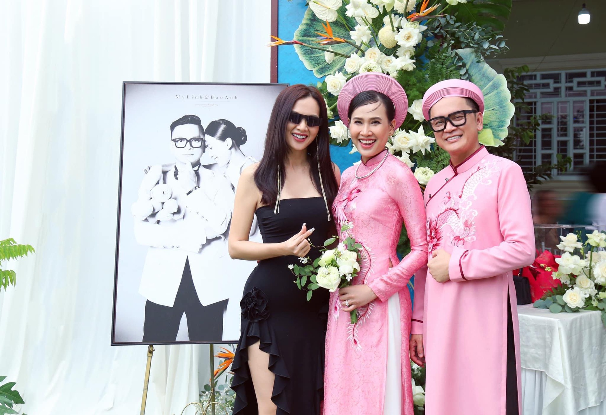 Hoa hậu Dương Mỹ Linh rạng rỡ diện áo dài trong lễ gia tiên tại Bến Tre  - Ảnh 2.
