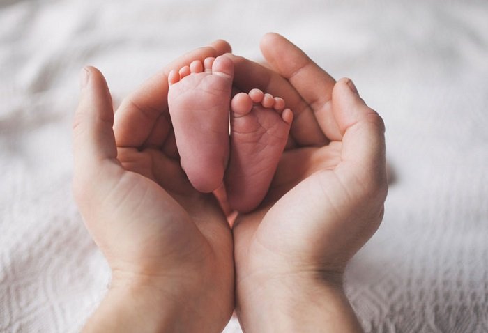 Nguyên nhân và cách cải thiện khi trẻ sơ sinh bị lạnh tay chân - Ảnh 1. Nguyên nhân và cách cải thiện khi trẻ sơ sinh bị lạnh tay chân - Ảnh 1.