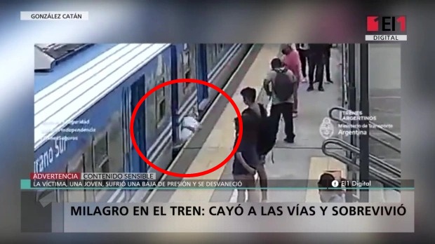 Heart-stopping moment: The girl staggered down onto the tracks just as the train was running, what happened next made all the witnesses 