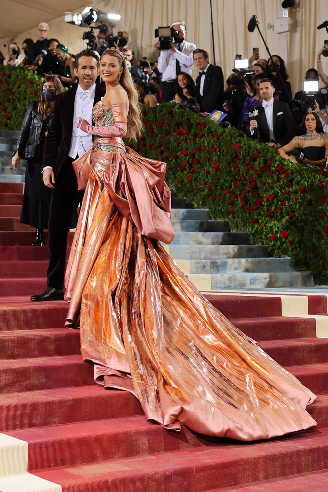 Calling Blake Lively the Queen of Met Gala because she dresses up with the theme every year, and it's great to match the red carpet color!  - Photo 4.
