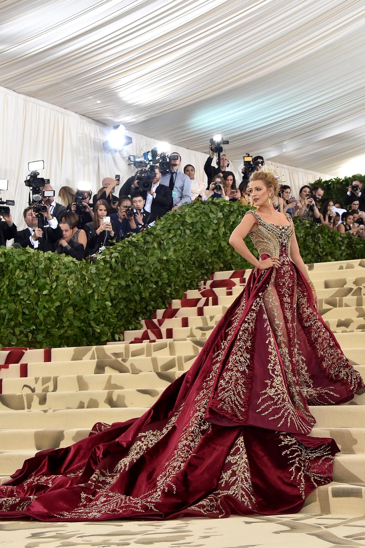 Calling Blake Lively the Queen of Met Gala because she dresses up with the theme every year, and it's great to match the red carpet color!  - Photo 3.