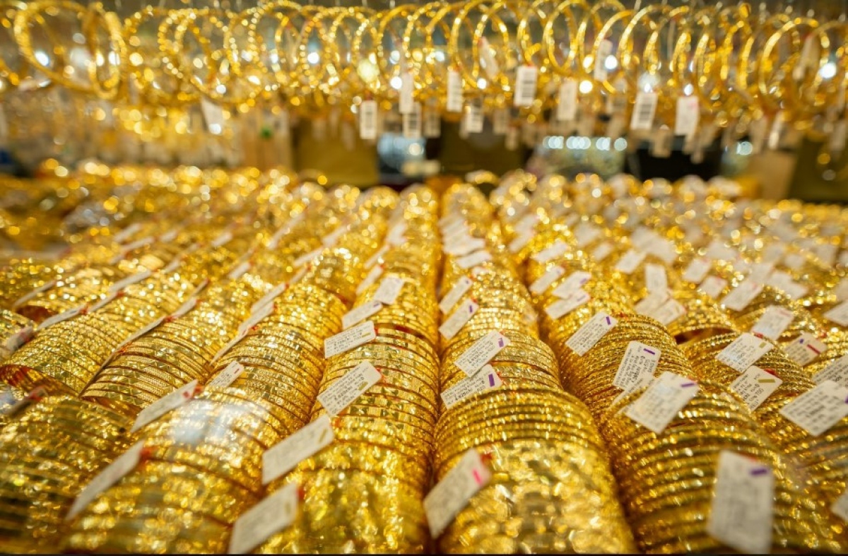 Giá vàng trong nước tăng chậm hơn giá thế giới - Ảnh 1.