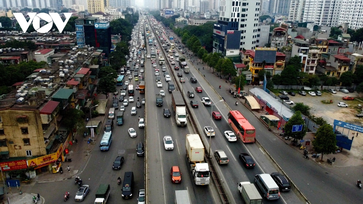 Giao thông Hà Nội thông thoáng trong ngày đầu tiên đi làm sau kỳ nghỉ Tết - Ảnh 13.