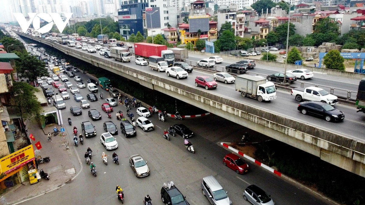 Giao thông Hà Nội thông thoáng trong ngày đầu tiên đi làm sau kỳ nghỉ Tết - Ảnh 14.