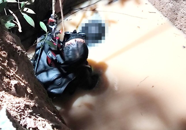 Điều tra vụ thi thể dưới giếng nước ở Bình Phước - Ảnh 1.
