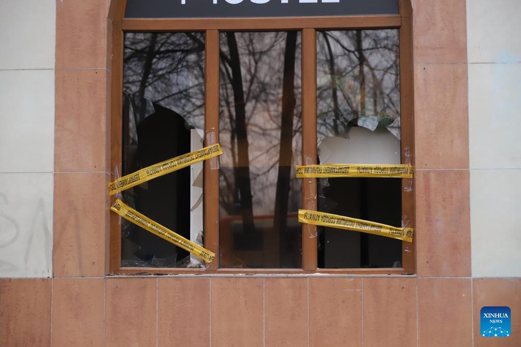 Cháy nhà trọ Kazakhstan khiến 13 người thiệt mạng - Ảnh 1.