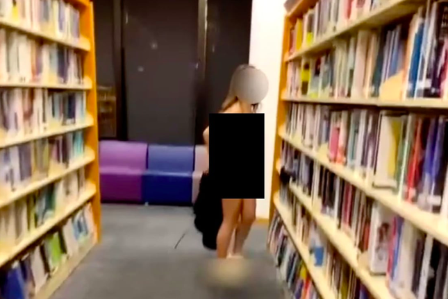 Cảnh sát Hong Kong (Trung Quốc) truy tìm một phụ nữ khoả thân trong thư viện - Ảnh 1.