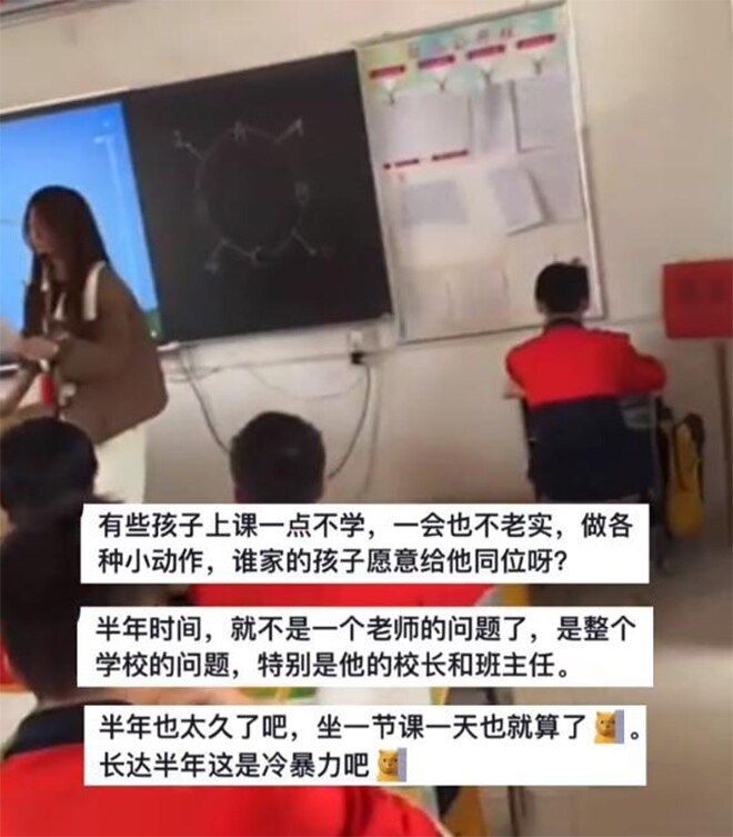 Giáo viên Trung Quốc bắt học sinh ngồi bàn riêng, úp mặt vào tường suốt 6 tháng - Ảnh 1. Giáo viên Trung Quốc bắt học sinh ngồi bàn riêng, úp mặt vào tường suốt 6 tháng - Ảnh 1.