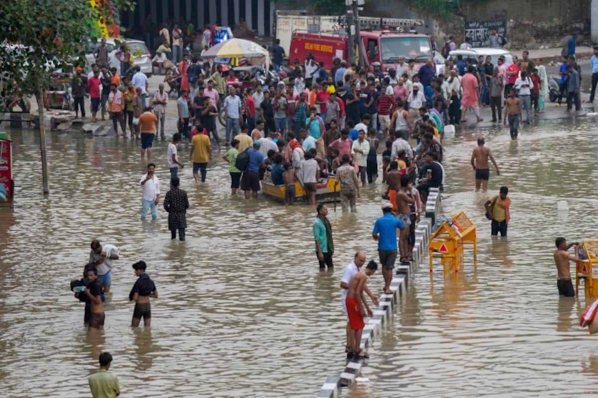 Gió mùa, mưa lớn và lũ lụt chưa từng có ở Ấn Độ làm bùng phát một loại dịch bệnh  - Ảnh 2.
