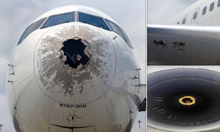Máy bay chở khách bị hư hỏng nặng khi lao vào tâm bão - Ảnh 1.