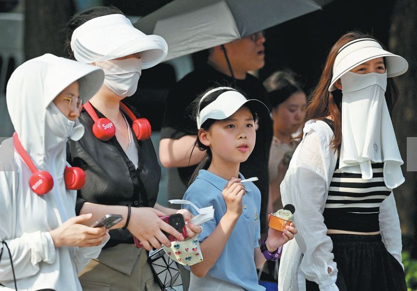 Trang phục chống nắng đắt hàng ở Trung Quốc - Ảnh 5.