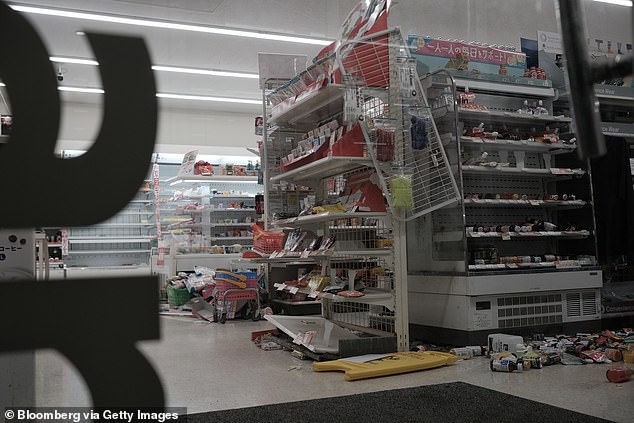 79514599-12917773-Convenience_store_items_lay_on_the_ground_following_an_earthquak-a-41_1704158704239
