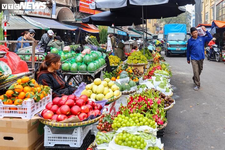 Thị trường mùng 1 cuối cùng của năm Giáp Thìn: Giá cau tăng gấp đôi - Ảnh 9.