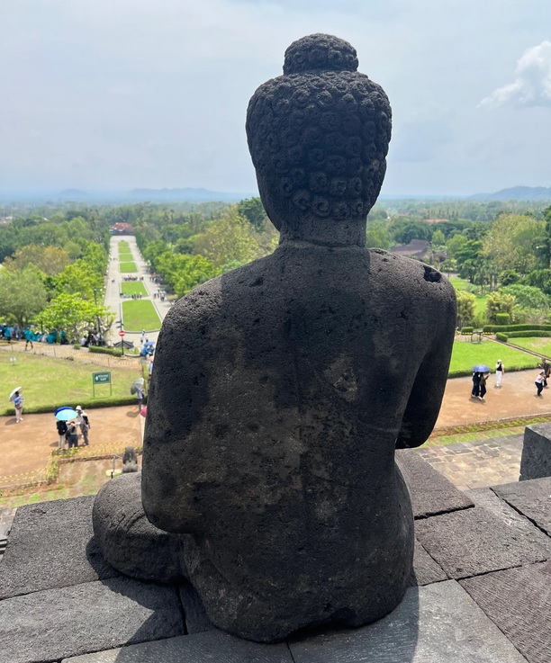 Only 16 Buddha statues have not had their heads stolen. Photo: Penny Watson