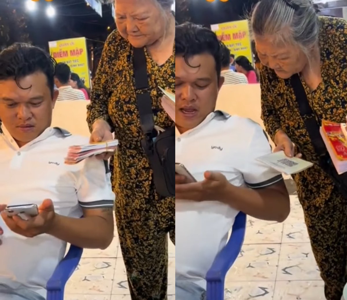 Đến cụ bà bán vé số cũng có mã QR để khách scan trả tiền, phải chăng "vua" của xu hướng thanh toán mới là đây? - Ảnh 1. Đến cụ bà bán vé số cũng có mã QR để khách scan trả tiền, phải chăng "vua" của xu hướng thanh toán mới là đây? - Ảnh 1.