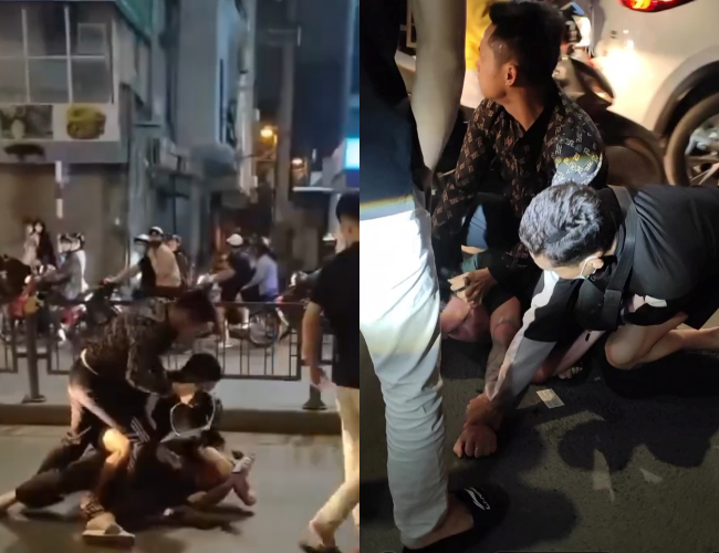 Thanh niên bế bé gái đứng giữa đường chặn ô tô hô tất cả quỳ xuống, tấn công người đi đường ở Hà Nội - Ảnh 2.