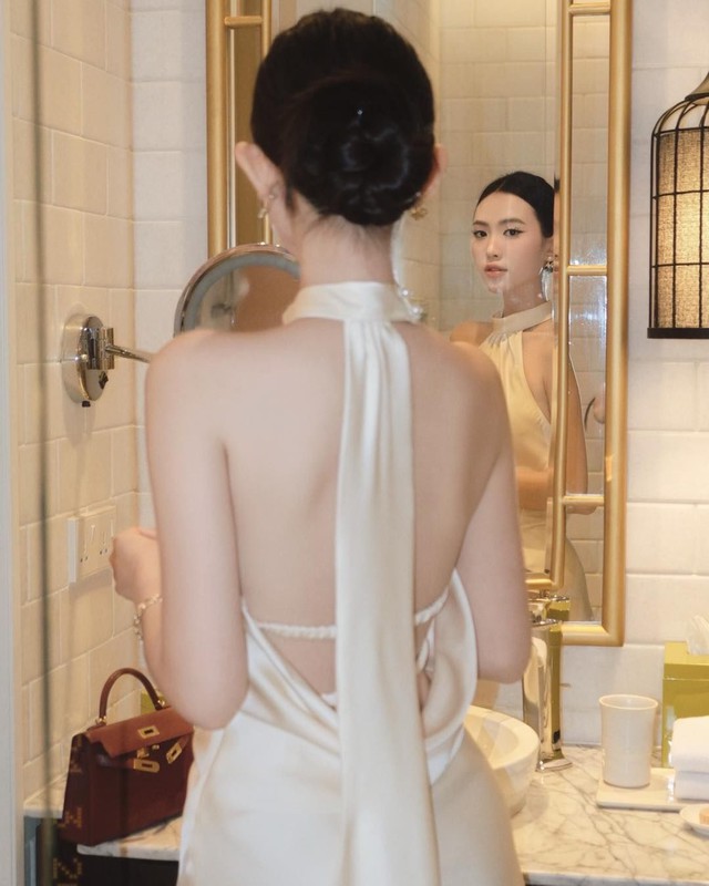 Chấm điểm 10 cho trang phục đi ăn cưới của Hoa hậu Đặng Thu Thảo: Thanh lịch, nền nã, sang trọng - Ảnh 16.