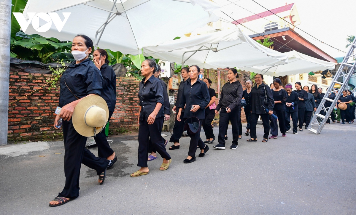 Cập nhật: Người dân xếp hàng từ 5h sáng chờ vào viếng Tổng Bí thư Nguyễn Phú Trọng - Ảnh 1.