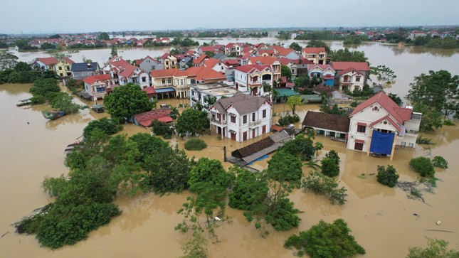 Hà Nội: Ngập lụt ở Chương Mỹ có thể kéo dài thêm 10-13 ngày - Ảnh 1.