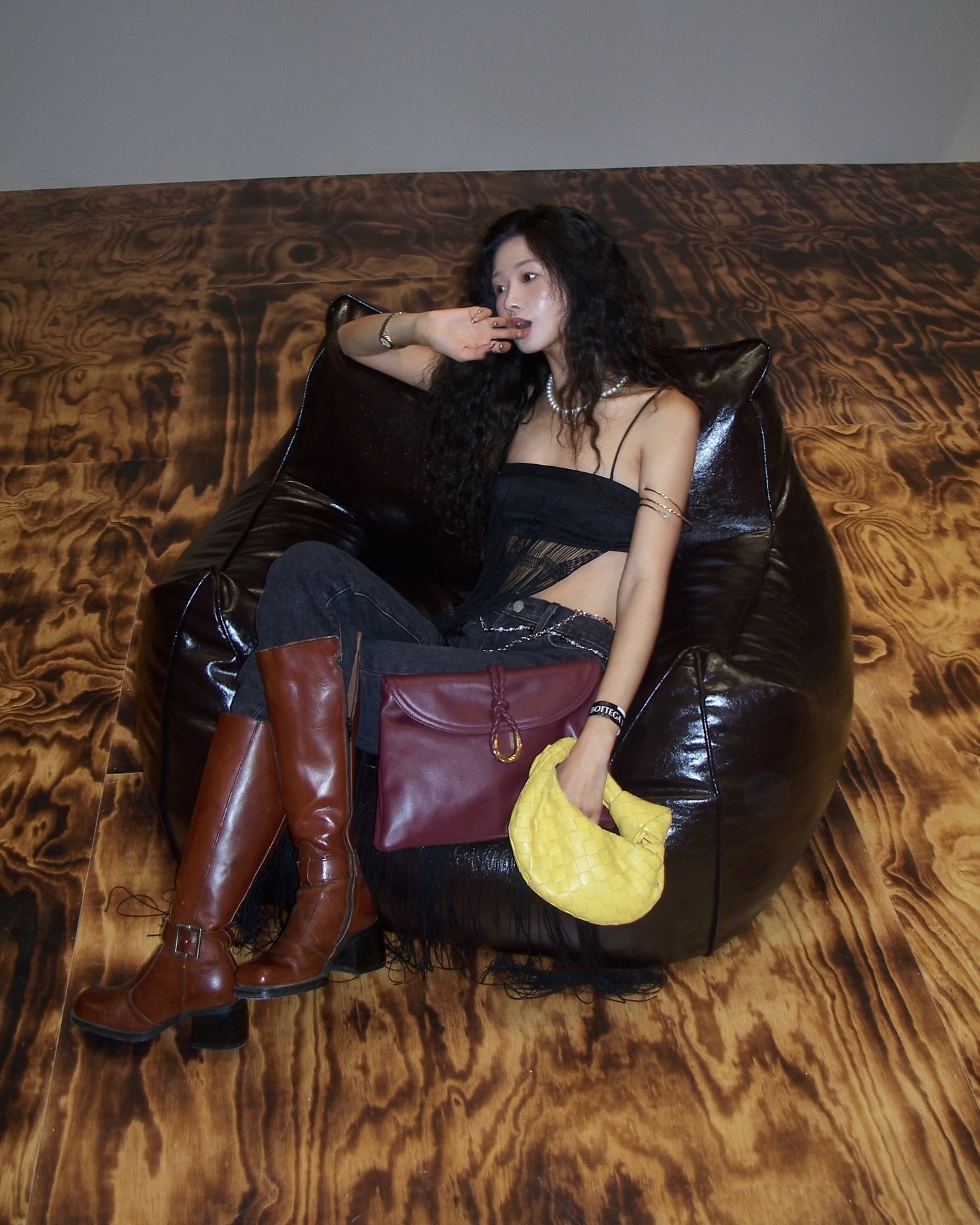 newbottega-may-be-an-image-of-1-person-leather-purse-and-beanbag-chair-1726137521043980887029-1726147468778-1726147468917251618671-1726200392872-172620039296835721795.jpg