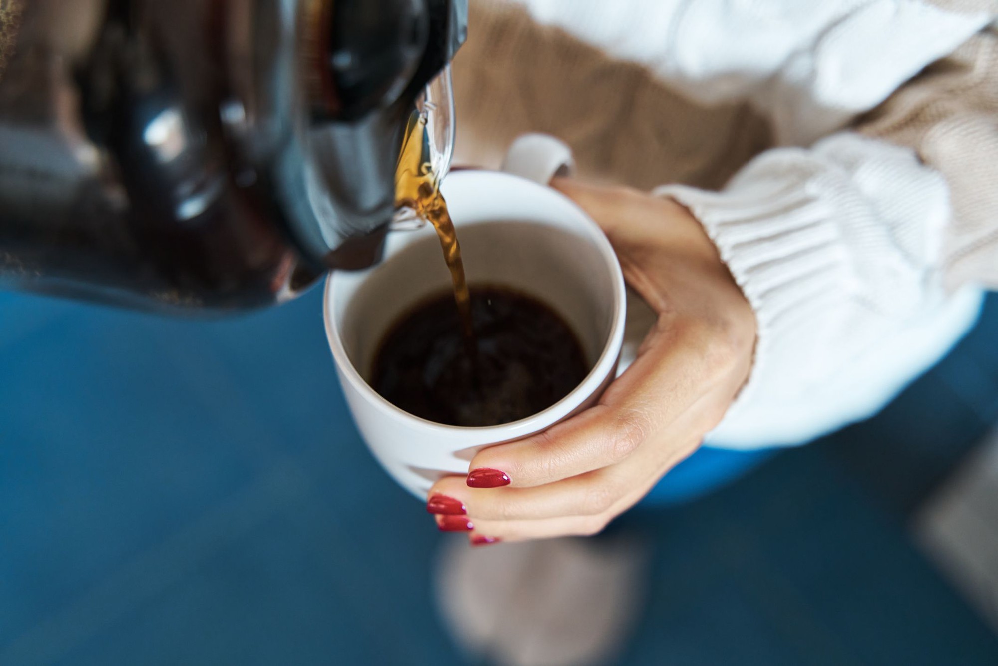 woman-pouring-herself-hot-coffee-to-a-mug-royalty-free-image-1705614312-1725239290131528068465-1725244365822-1725244366132827417712.jpg